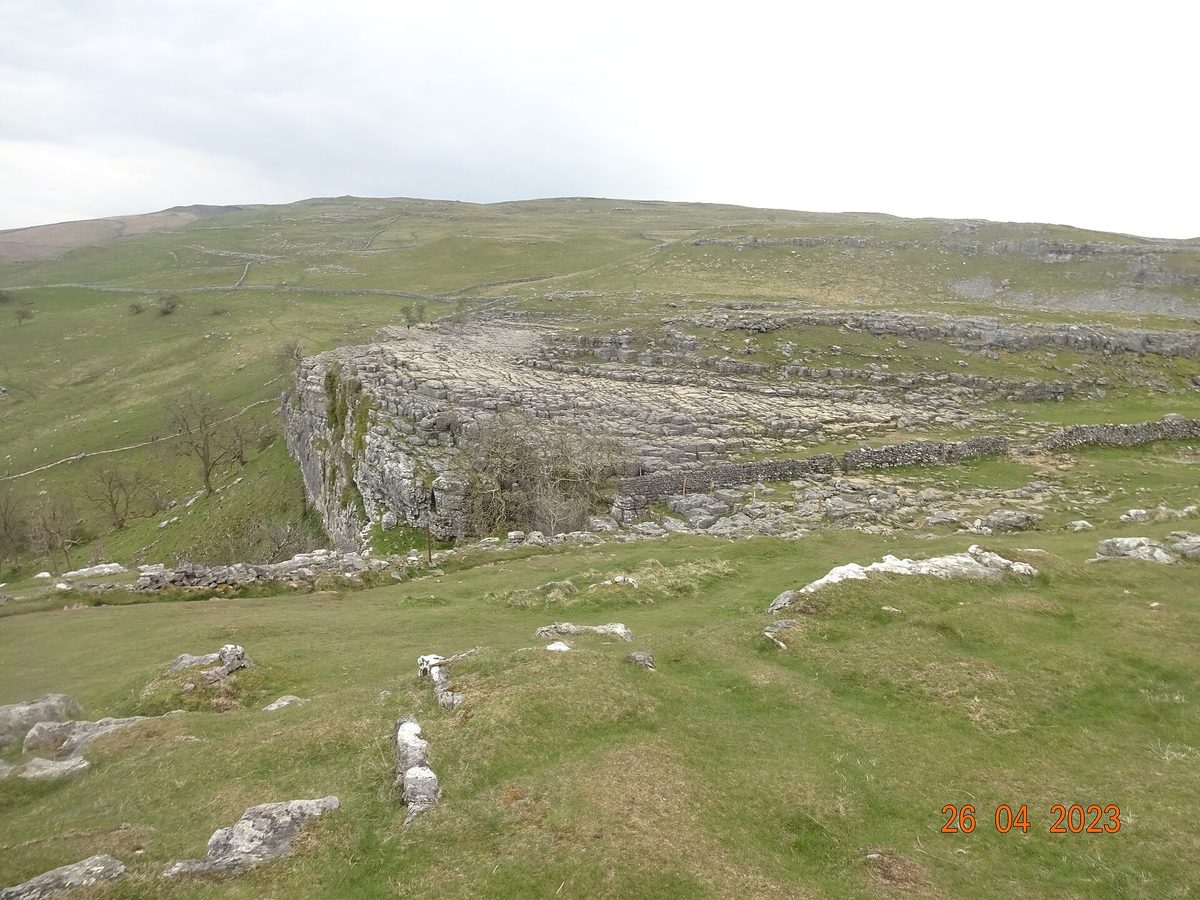The great curved limestone amphitheatre of Malham Cove in the Yorkshire Dales