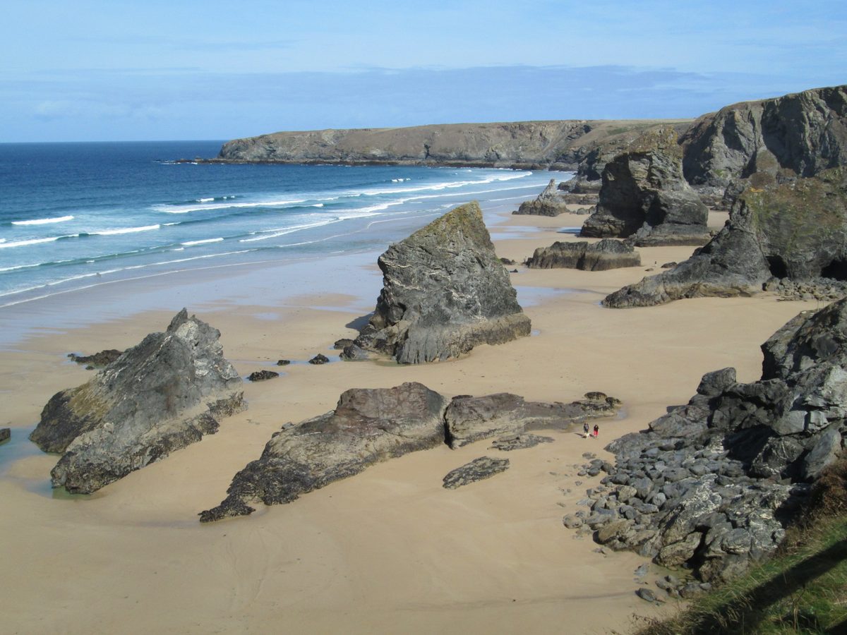 Dramatic sea stacks and golden sand at Bedruthan Steps on the Cornwall coast