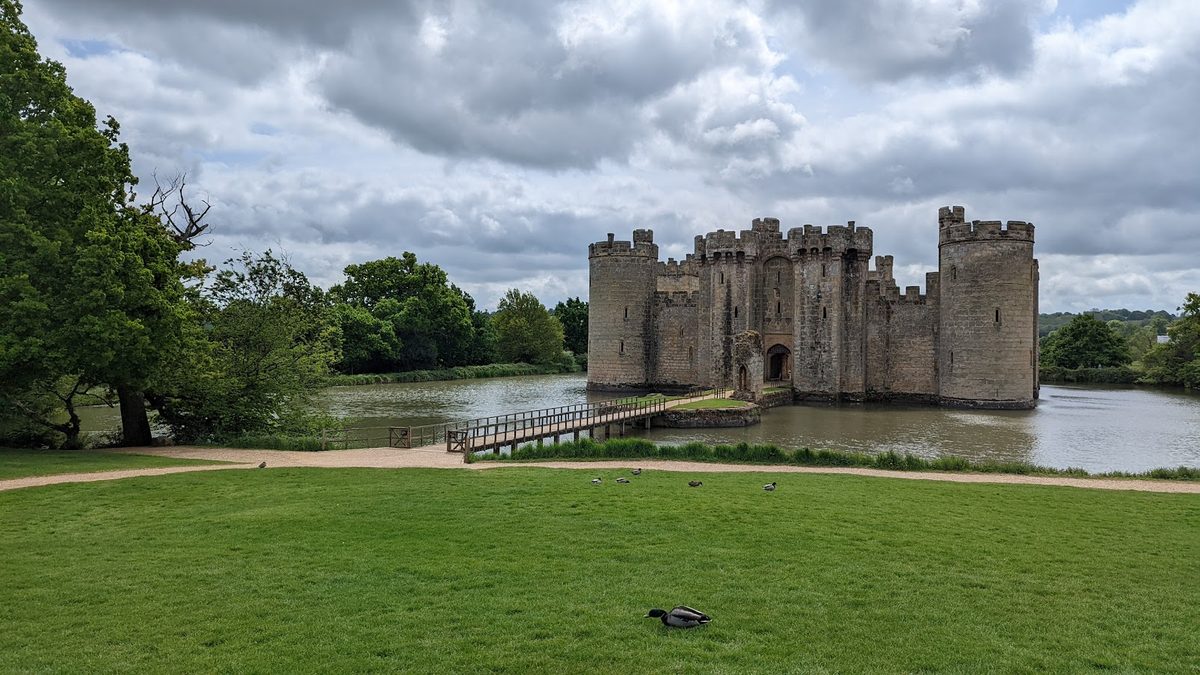 Bodiam Castle mirrored perfectly in its square moat in East Sussex