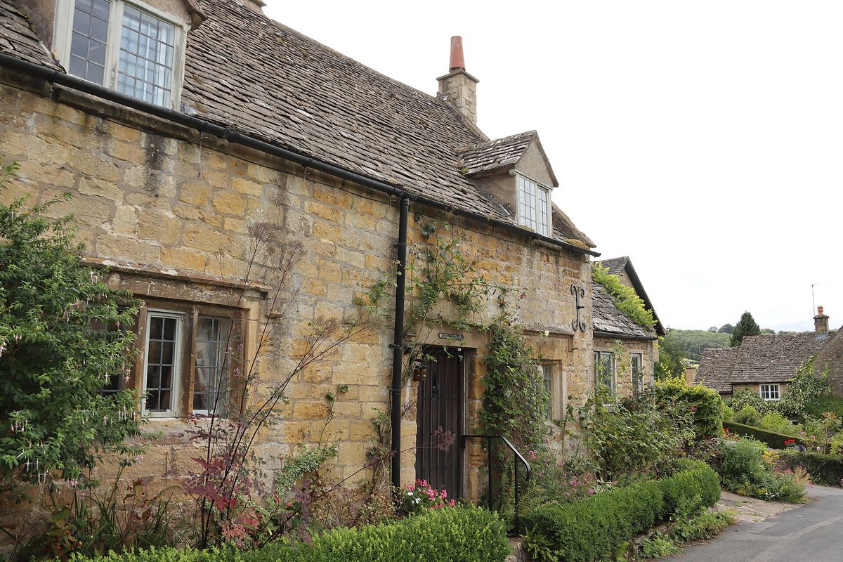 Lavender fields and honey-stone cottages at hilltop Snowshill, one of the least touristy Cotswolds villages
