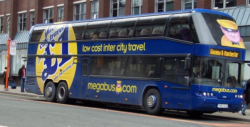 A Megabus coach on the motorway — the budget end of England coach travel