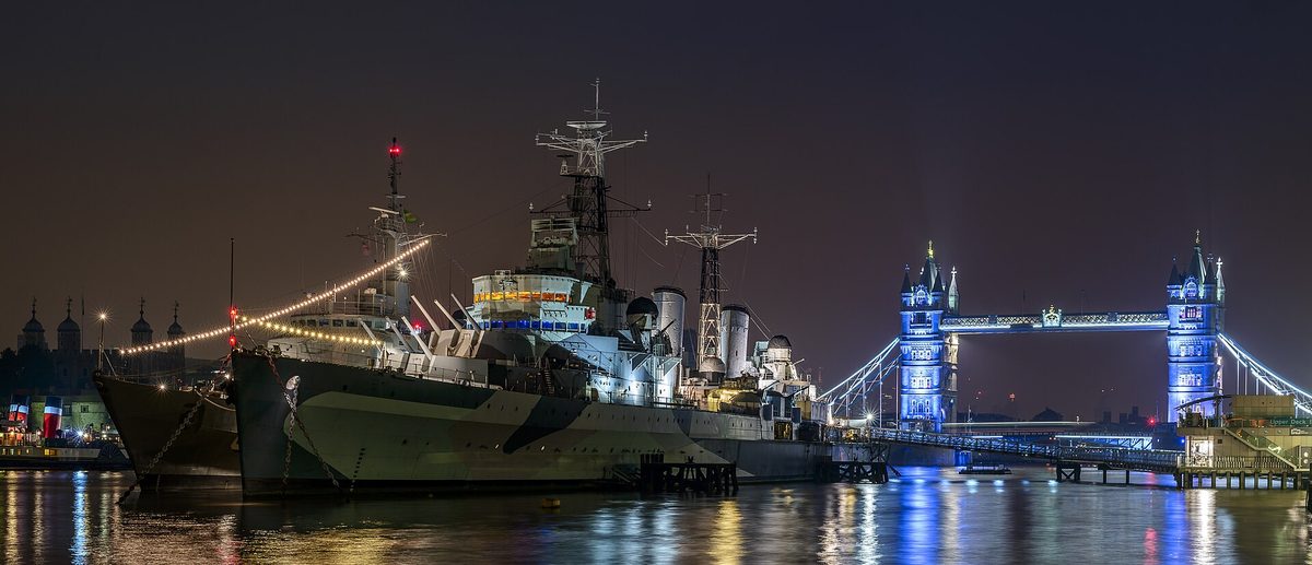 Tower Bridge over the Thames at dusk, one of the first landmarks first-time visitors see when following England travel tips