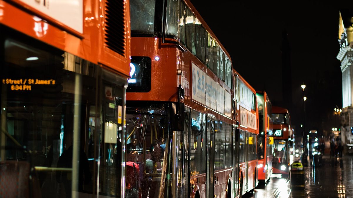A classic London bus — the city's daily transport cap sits at £8.90 in zones 1–2 for 2026
