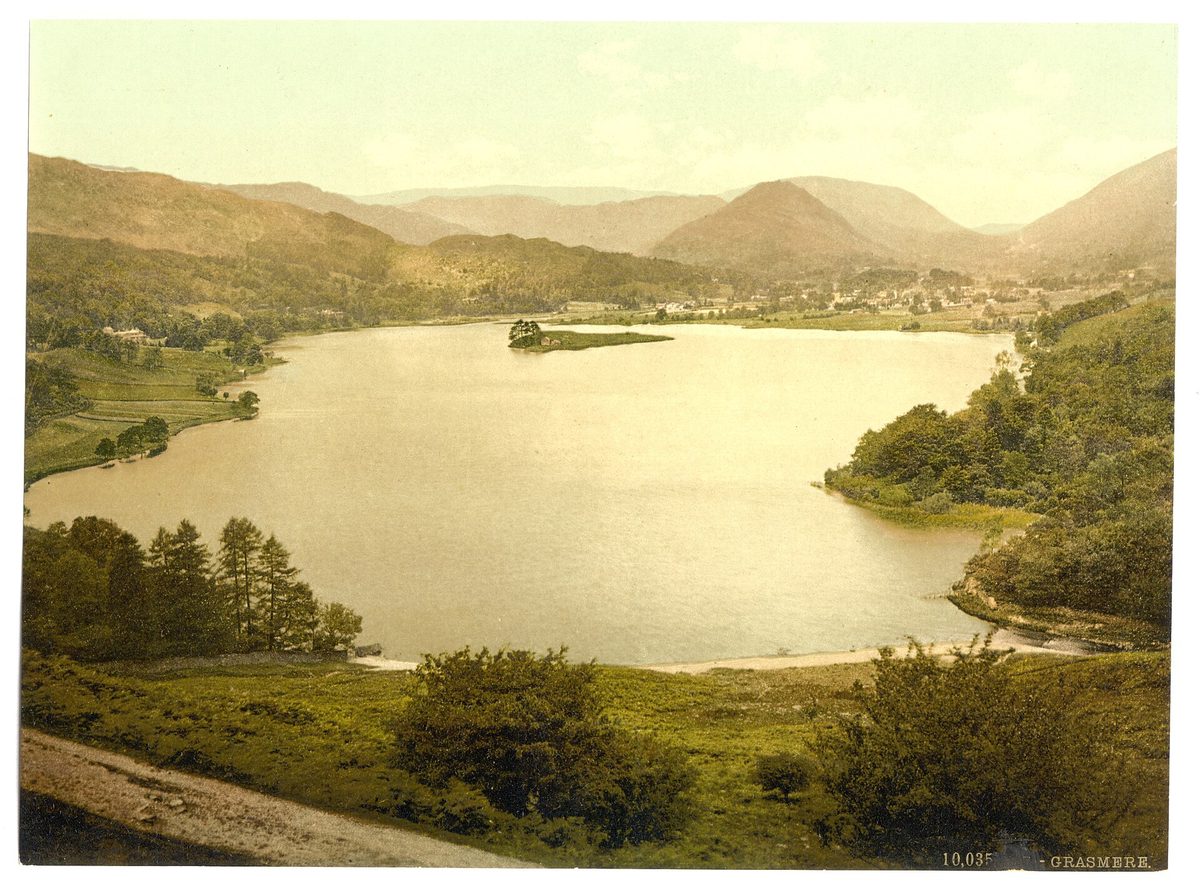 Still water and fells at Grasmere, a classic Lake District slow-travel base